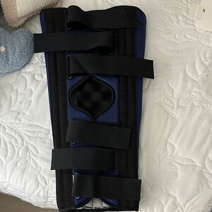 Blue and Black Leg Brace